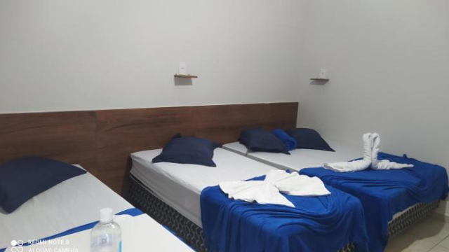 Room with Fridge, AC, and Free Garage - Aparecida