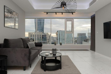 Luxurious Unique Tower Apartment with City Skyline by Renters Prestige