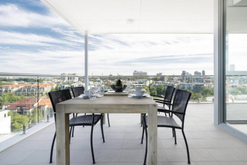Minimalist Penthouse Condo with Skyline Vistas