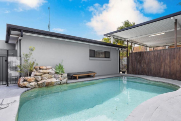 A Tranquil Sunshine Escape with Pool and Deck
