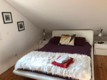 Chambre hôtes nichée sous les toits